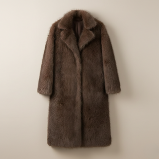 Brown fur coat on a beige background