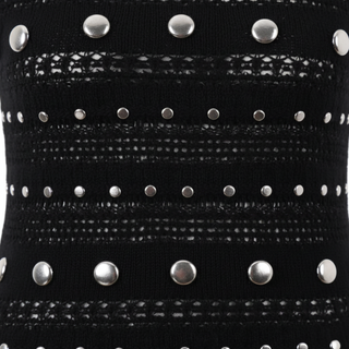 Black studded belt with silver studs on a black background