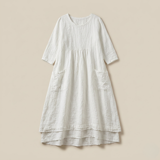 A white relaxed-fit midi dress with 3/4 sleeves shown as a flatlay on a neutral background.