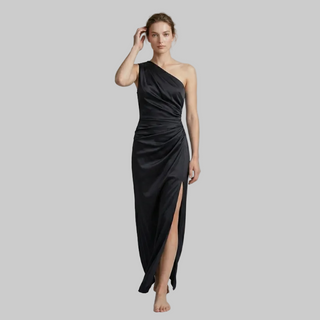 Premium black satin one-shoulder formal dress featuring a side slit and elegant draping, studio product photography.