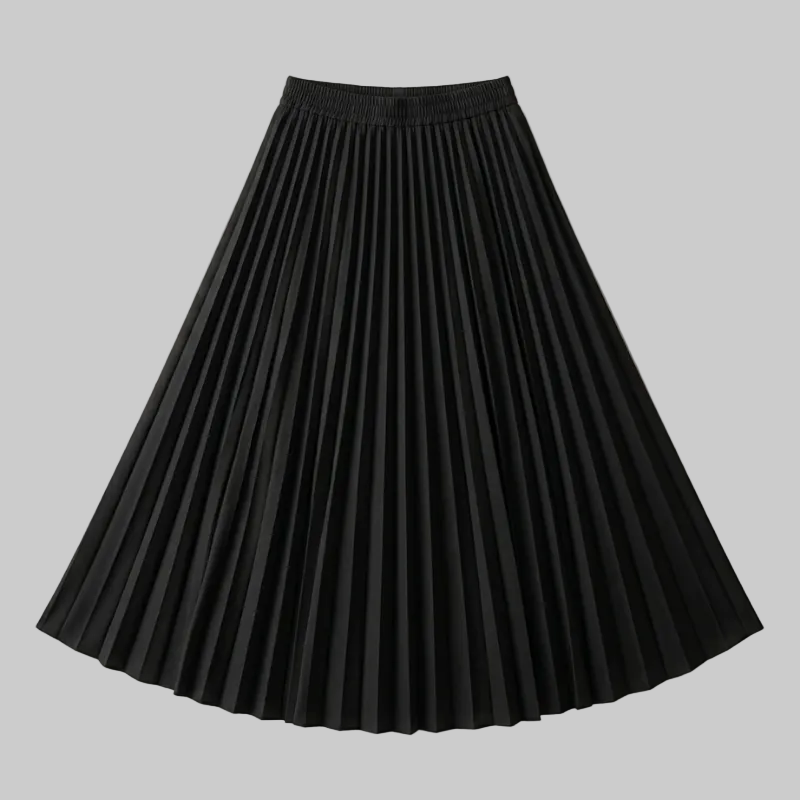 Black pleated skirt on a beige background