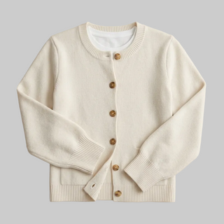 Flat lay of a cream crew-neck cardigan with brown tortoiseshell-style buttons.