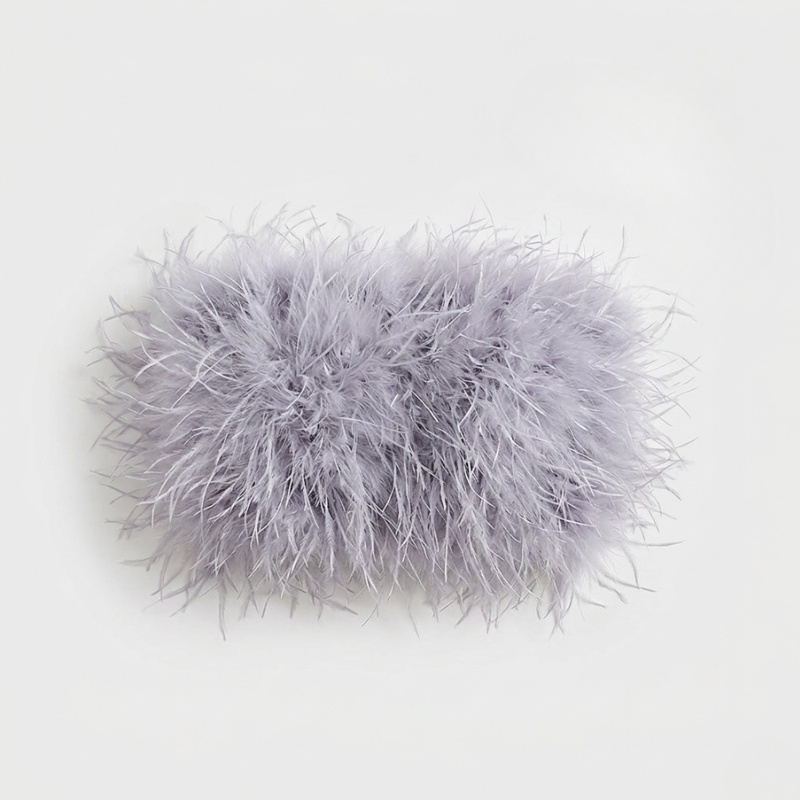 Fluffy gray pillow on a white background