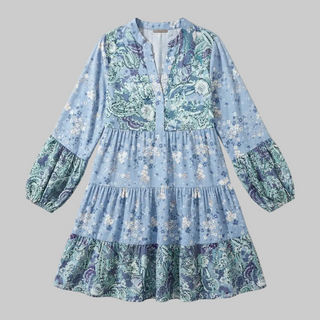 Blue floral dress with long sleeves on a beige background